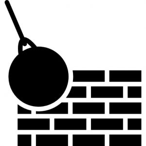 mur-de-briques-et-boule-de-demolition_318-62199